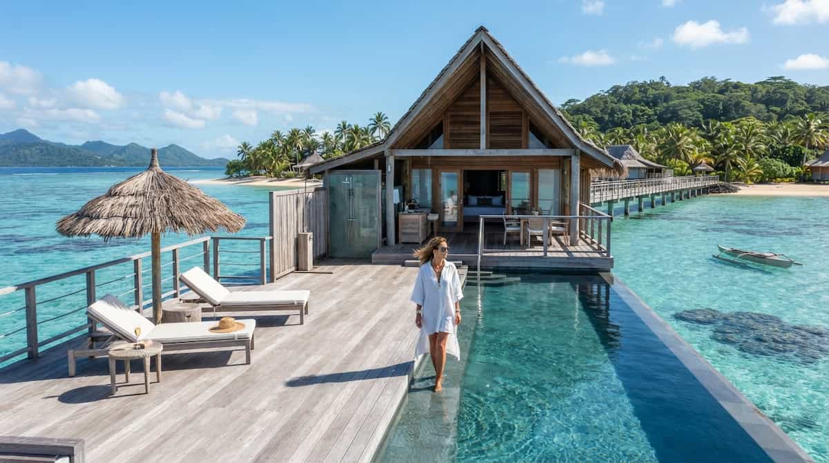 Paradisiacal Destination: 7 Best Spots for 2026 2 Overwater villa sanctuary in Fiji defining a tropical paradisiacal destination