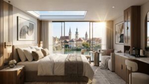 View of a European village from a luxury river cruise suite window