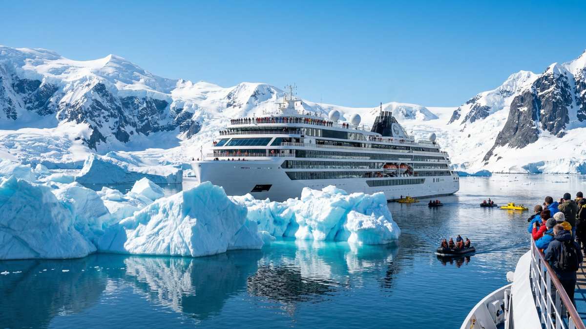 Multi-generational family enjoying the best luxury Antarctica cruises on a private deck.
